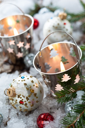 Christmas Decorations with candles in small pailsの写真素材