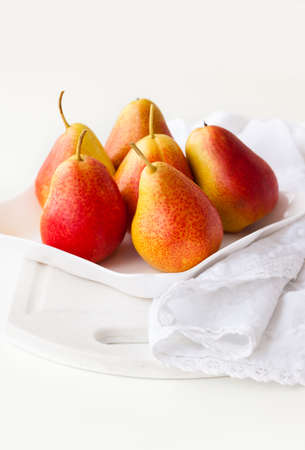 fresh pears on the tableの写真素材