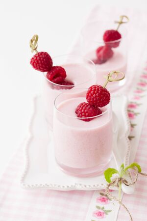 fresh fruit yogurt with raspberryの写真素材