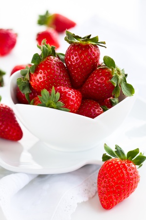 Fresh strawberry in the white bowlの写真素材