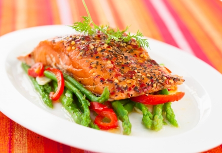 Salmon fillet with asparagus and red bell pepperの写真素材