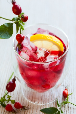 glass of cold rose hip teaの写真素材