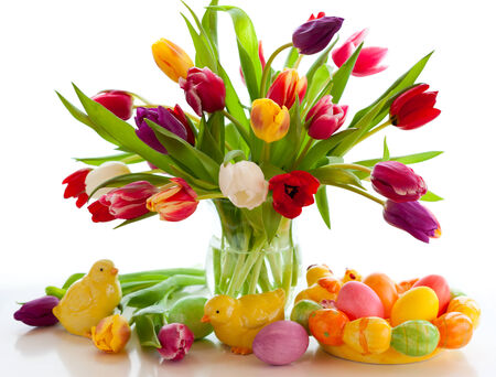 Easter table decorations with tulips and easter eggsの写真素材
