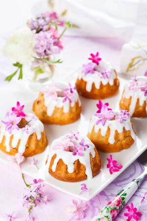 Mini Easter Fruit Cakes With Flower Decorationsの写真素材