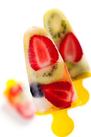 frozen strawberry,kiwi,peach and coconut water ice creamの写真素材