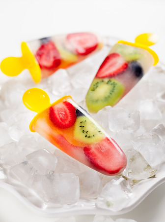 frozen strawberry,kiwi,peach and coconut water ice creamの写真素材