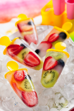 frozen strawberry,kiwi,peach and coconut water ice creamの写真素材