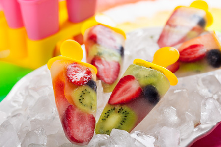 frozen strawberry,kiwi,peach and coconut water ice creamの写真素材