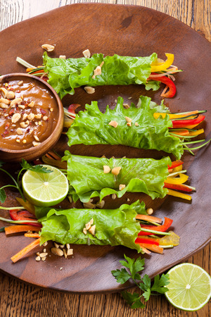 Lettuce wraps with  peanut dipping sauceの写真素材