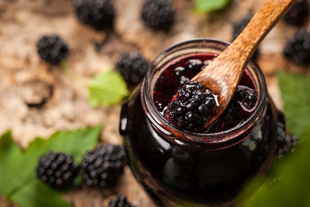 Blackberry jam in a jarの写真素材
