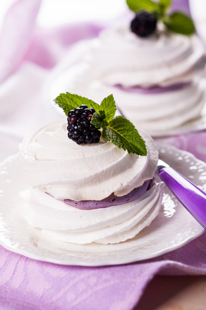 Meringue with blackberry and creamの写真素材