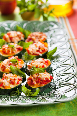 Zucchini, Pepper and Tomato gratin with herbs and cheeseの写真素材