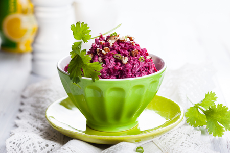 Beet salad with nut and dressingの写真素材