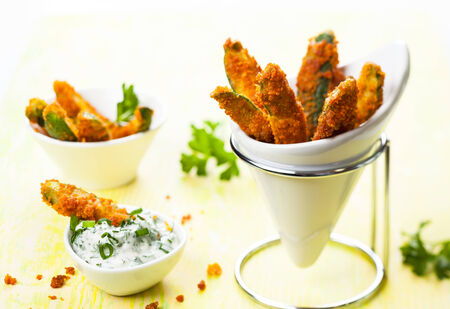 Zucchini Fries with parmesan and sauceの写真素材