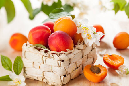 baskets with fresh ripe apricotsの写真素材