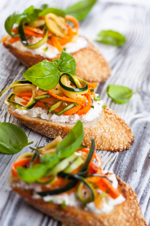 Zucchini,carrot and goat's cheese bruschettaの写真素材