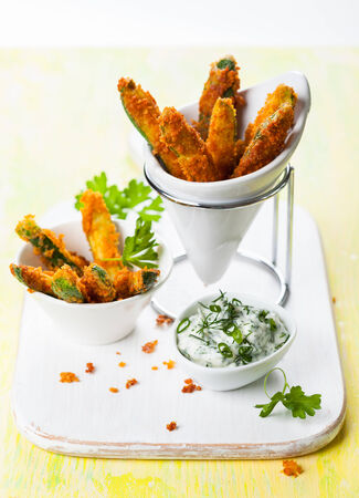 Zucchini Fries with parmesan and sauceの写真素材