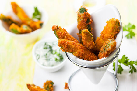 Zucchini Fries with parmesan and sauceの写真素材