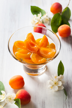 Fresh apricot compote in glass bowlの写真素材