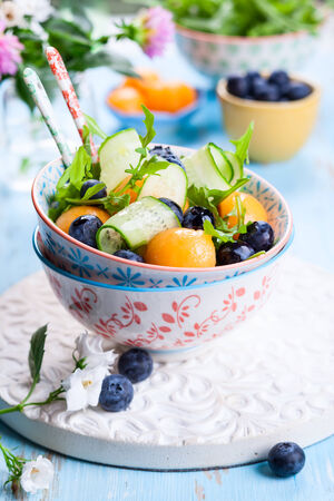 Melon,cucumber and blueberry saladの写真素材