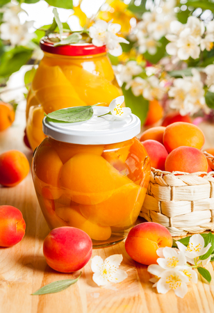Jars of apricot and peach preservesの写真素材