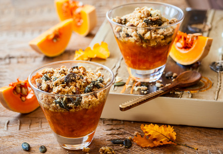 Sweet pumpkin crumble with pumpkin seeds and pine nutの写真素材