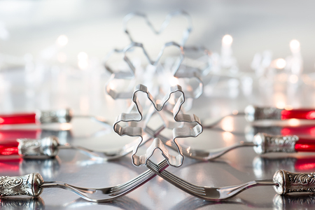 Christmas place setting with snowflake cookie cutterの写真素材