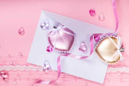 Envelope with valentine hearts on the pink backgroundの写真素材