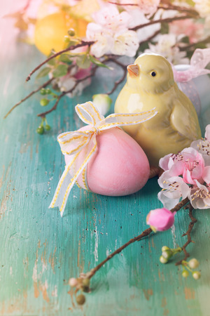 Easter decoration with spring flowers,chick and eggs in vintage styleの写真素材