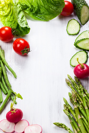 Fresh vegetables on the white wooden tableの写真素材