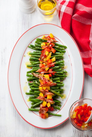 Green beans with bacon and vegetablesの写真素材