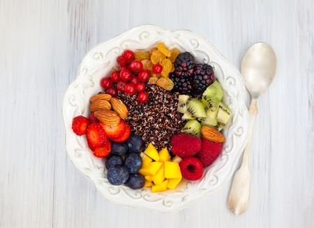 Honey black quinoa with fruits,berries and nut for breakfastの写真素材