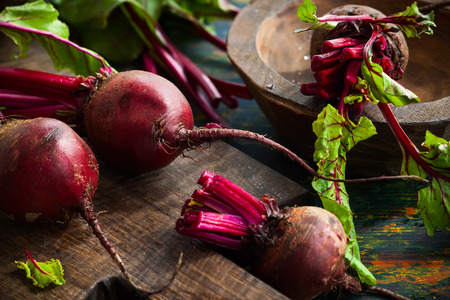 Fresh organic beetroot with green leavesの写真素材