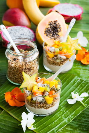 Healthy breakfast with exotic fruits, yogurt and granolaの写真素材
