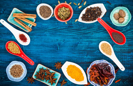 Various asian spices  on a blue wooden background. Top viewの写真素材