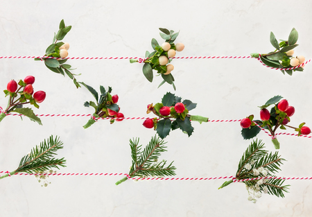 Christmas  garlands  made of fresh flowers,leaves,berries and fir branchesの写真素材