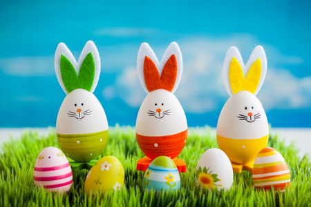 Three colourful easter bunny on the green
grassの写真素材