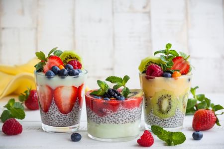 Layered berry and chia seeds smoothiesの写真素材