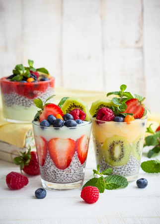 Layered berry and chia seeds smoothiesの写真素材