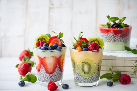 Layered berry and chia seeds smoothiesの写真素材