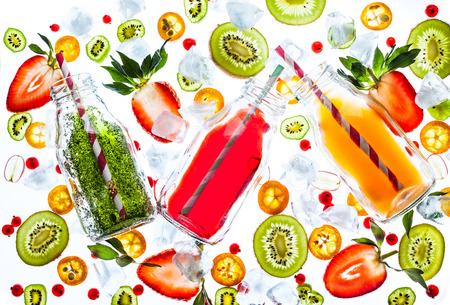 Fresh juice and smoothies with berries on white background. Transparent pattern.の写真素材