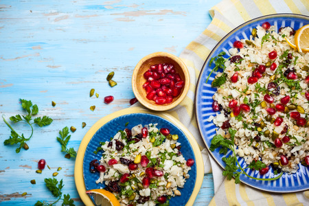 Cauliflower couscous with dried cranberry, pomegranate, pistachio and pine nutの写真素材