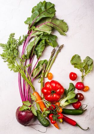Fresh different vegetables  on the white background. Top viewの写真素材