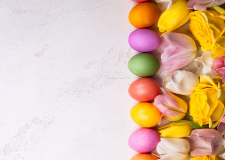 Colorful tulips and Easter eggs.の写真素材