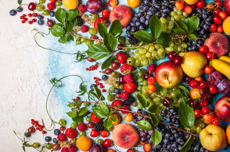 Still life of various fruits and berries . Top viewの写真素材