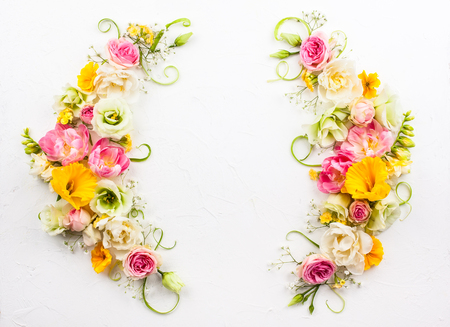 Festive flower composition on the white  background with copy space. Overhead view.の写真素材