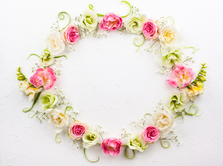 Festive flower composition on the white  background with copy space. Overhead view.の写真素材