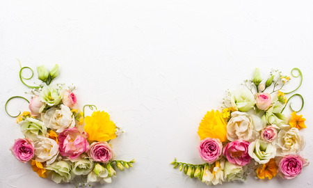 Festive flower composition on the white  background with copy space. Overhead view.の写真素材