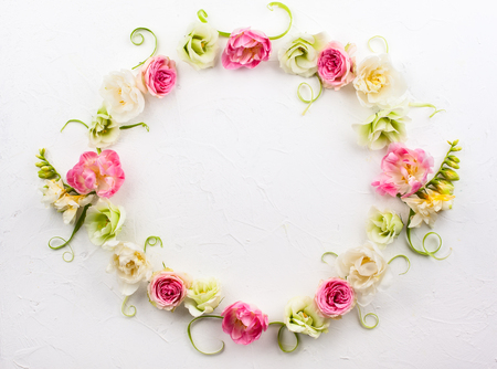 Festive flower composition on the white  background with copy space. Overhead view.の写真素材