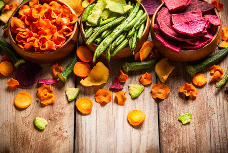 Dried vegetables chips from carrot, beet, parsnip and other vegetables . Organic diet and vegan food.の写真素材